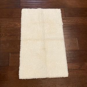 2/$20 Fluffy super soft, creamy/white bath mat